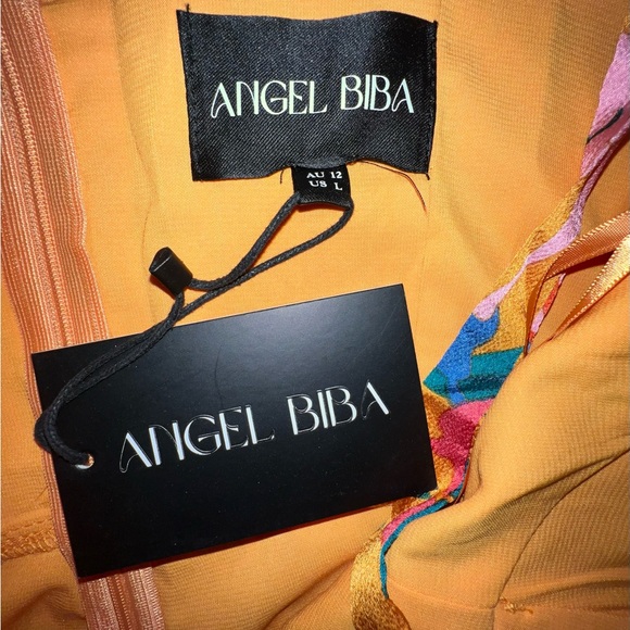 NWT Hello Molly Orange floral romper size large - Picture 3 of 6